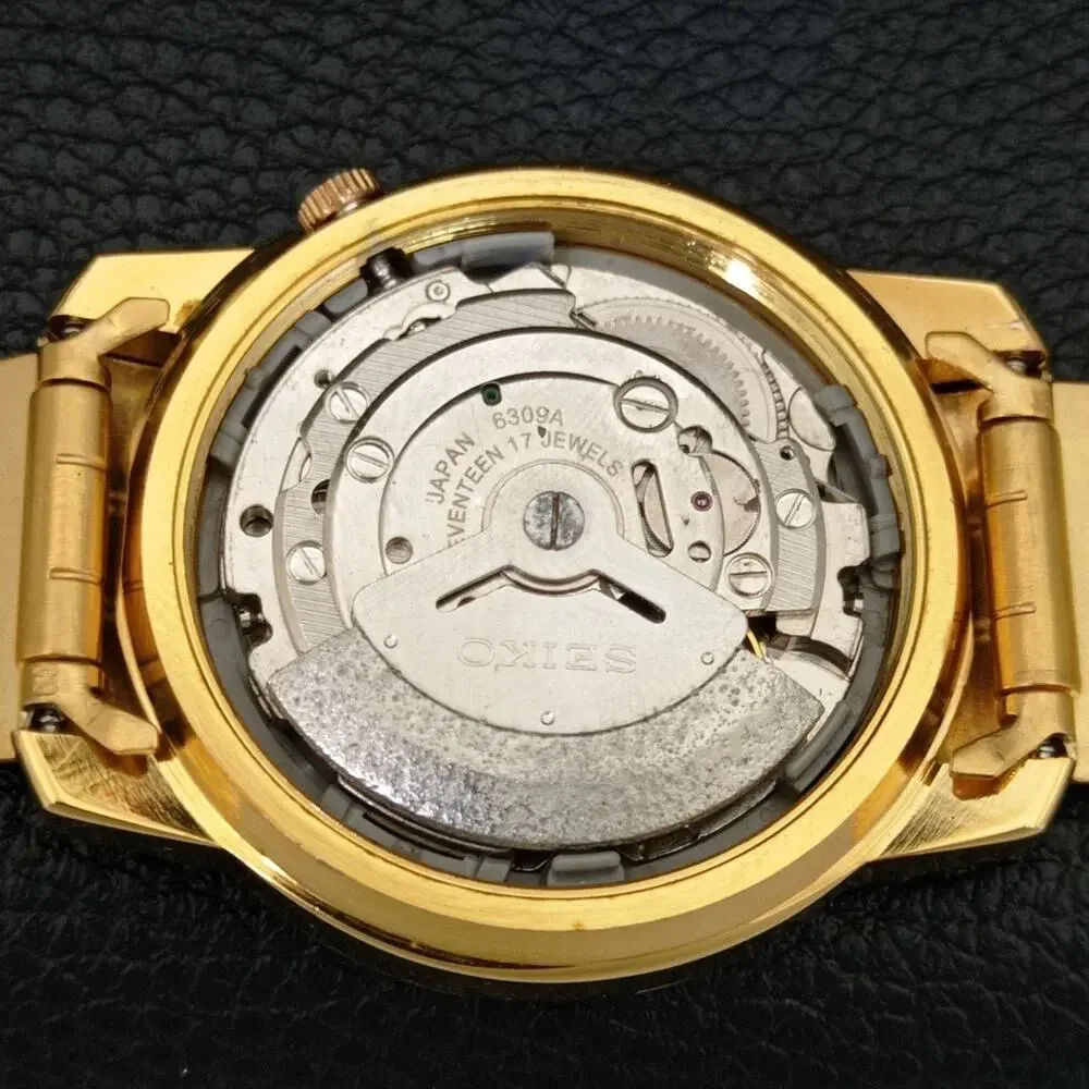 Vintage 1973 Seiko Automatic Mens Gold Watch W/daydate & Arabic accents